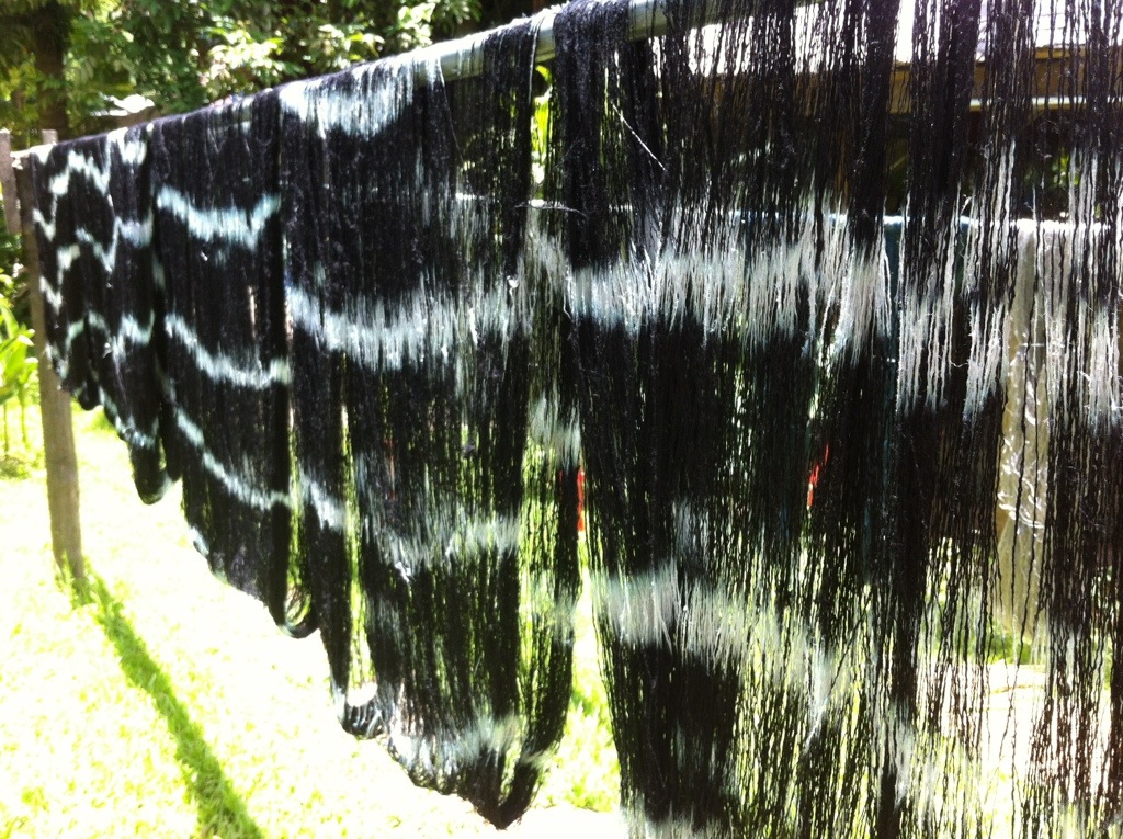 ikat silk drying after dyeing